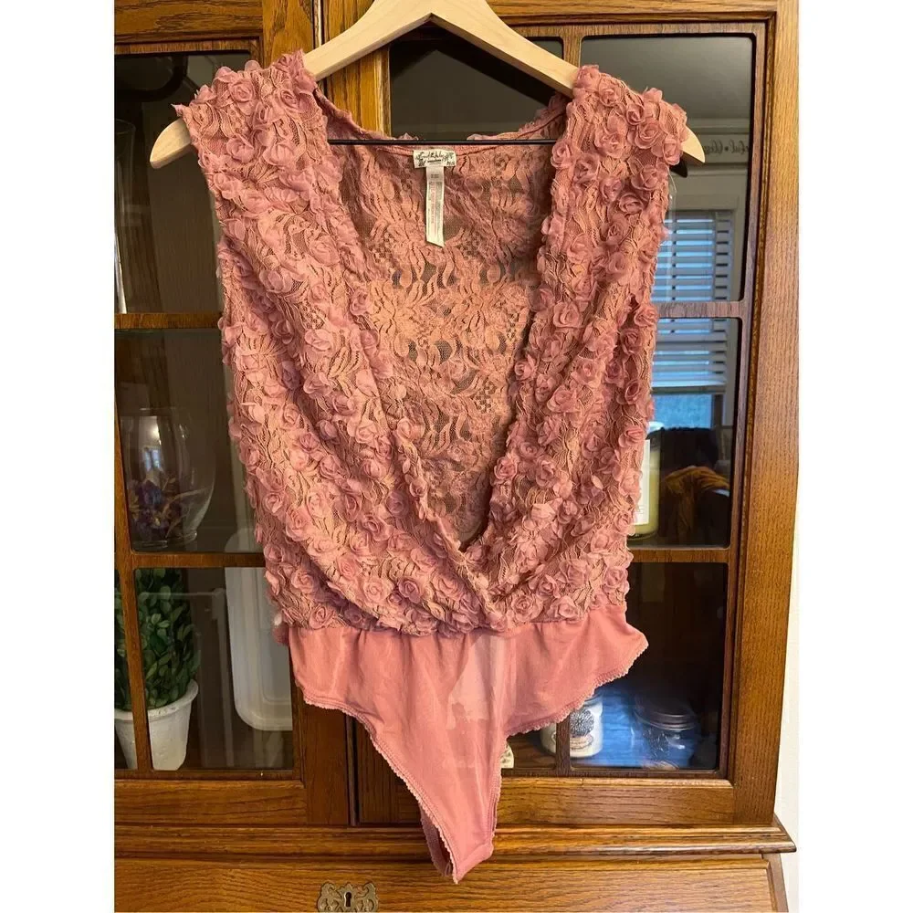 Free people - 2 hot 2 handle pink bodysuit size Medium
